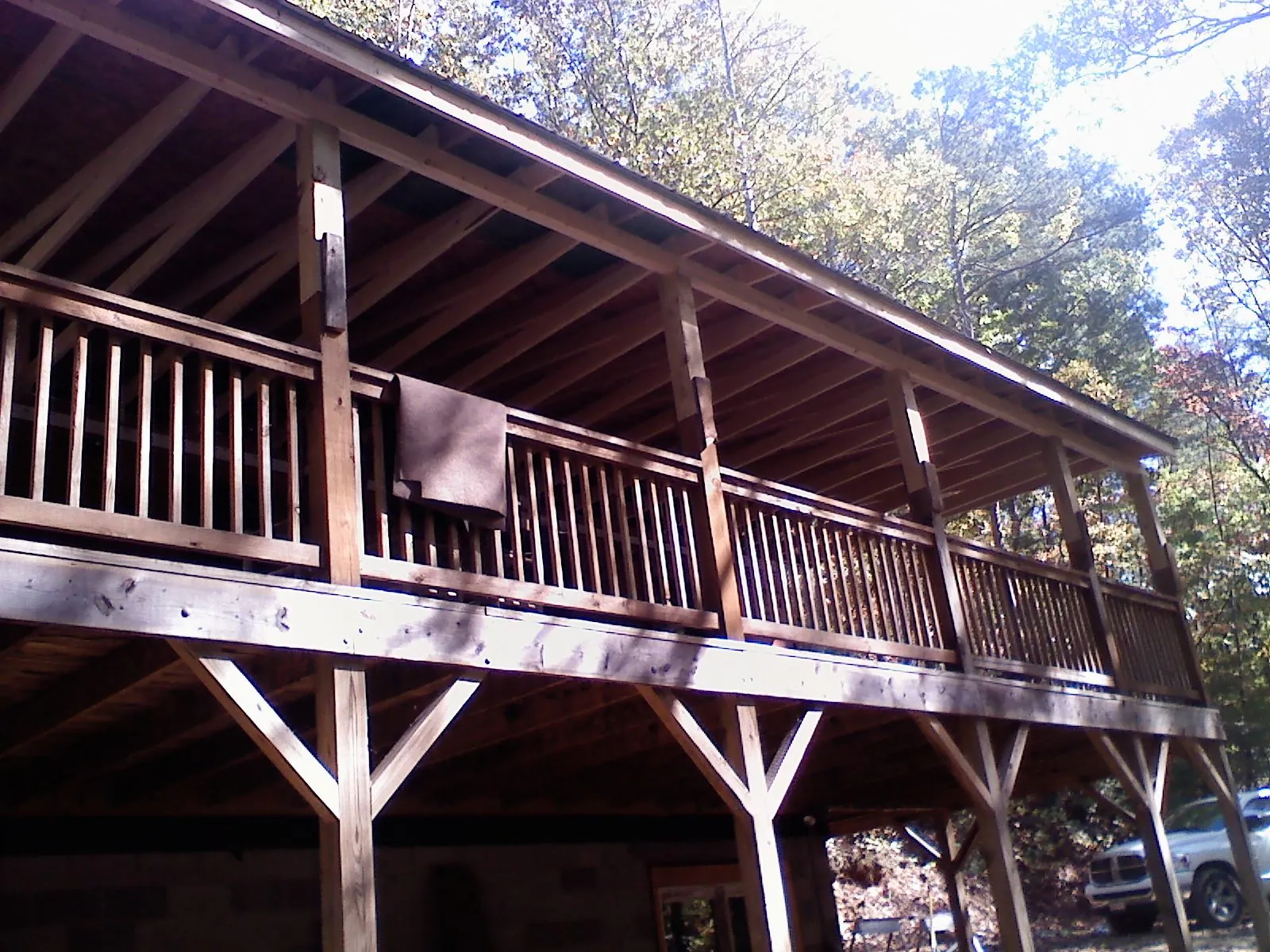 Timber framing under a new elevated porch and deck — Roof Leak Repair in Trinity Center by Roofing Brothers